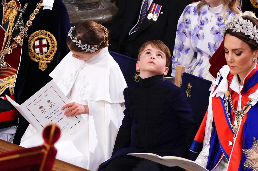 Princess Charlotte and Prince Louis appear a bit distracted at the coronation.