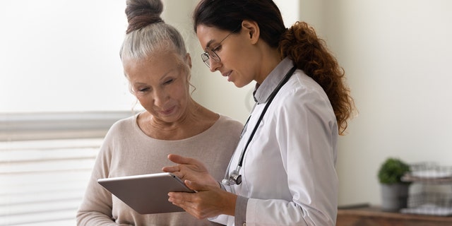 Doctor with patient