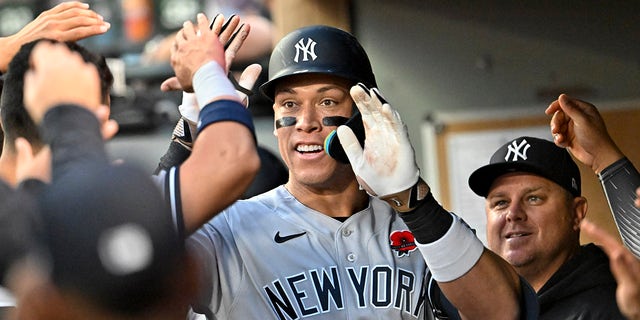 Aaron Judge celebrates with teammates