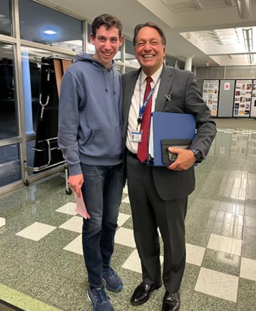 Ethan Brown was cheered on by Superintendent Hank Grishman after his speech.