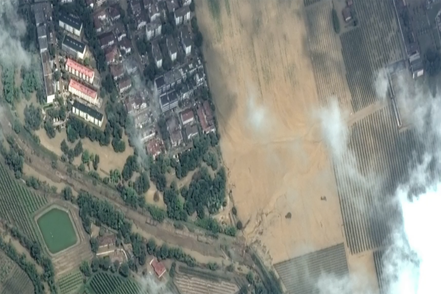 The raging waters clogged flood channels with debris.