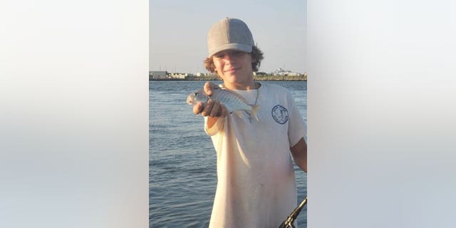 Gavin Knuppe holding fish