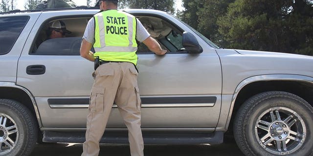 State police outside a vehicle