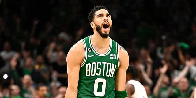 Jayson Tatum celebrates