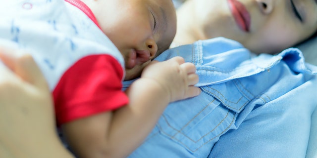 baby and mother sleeping