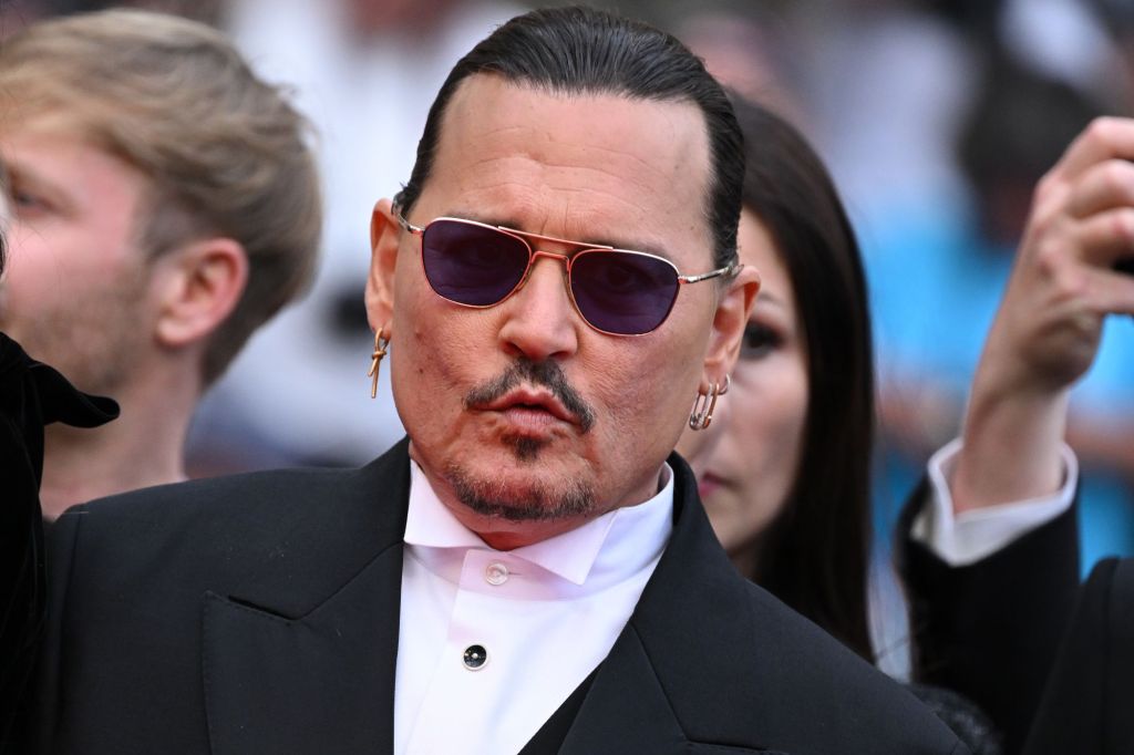 Johnny Depp attends the Cannes premiere of his comeback movie, "Jeanne du Barry." 