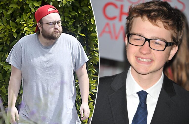 ‘Two and a Half Men’ star Angus T. Jones unrecognizable on barefoot walk