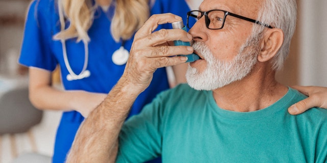 Older man with inhaler