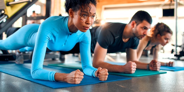 People exercising at gym