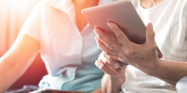 Seniors using tablet