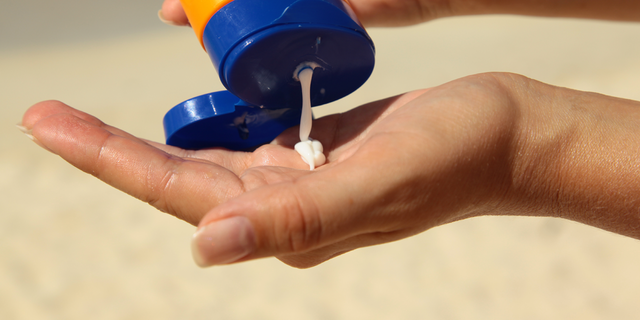 Sunscreen cream in a hand