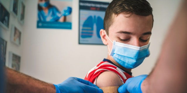 Teen boy after vaccine