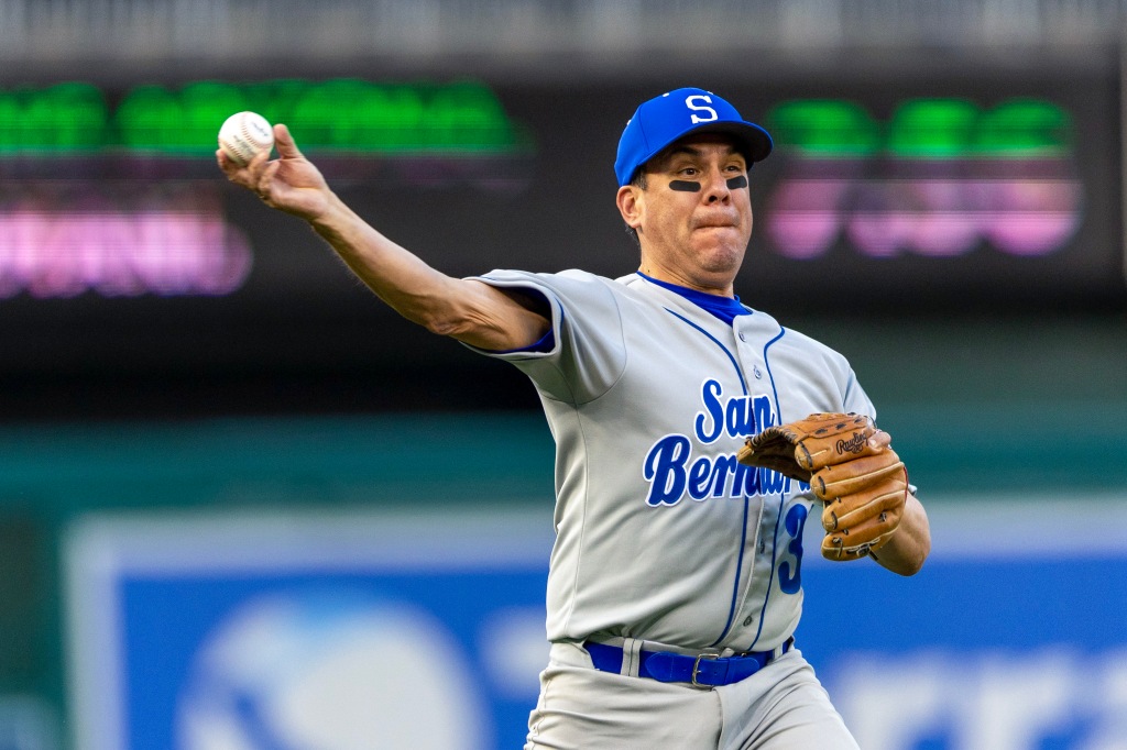 Rep. Pete Aguilar (D-CA) fields a ball against the Republicans during the Congressional Baseball Game.