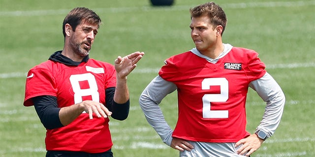 Zach Wilson and Aaron Rodgers at OTA's