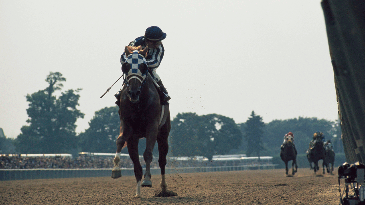 Secretariat and jockey Ron Turcotte racing in the Belmont Stakes