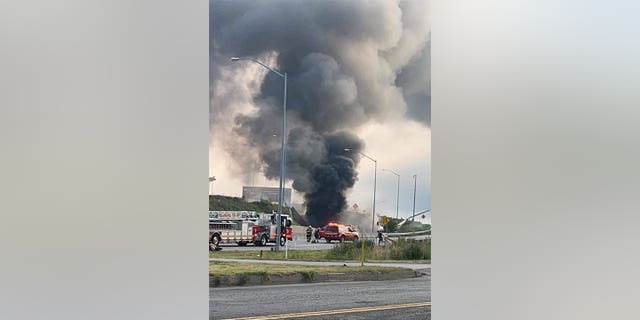 First responders attending to a fire.