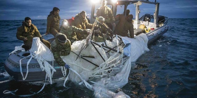 Chinese Balloon recovery onto boat