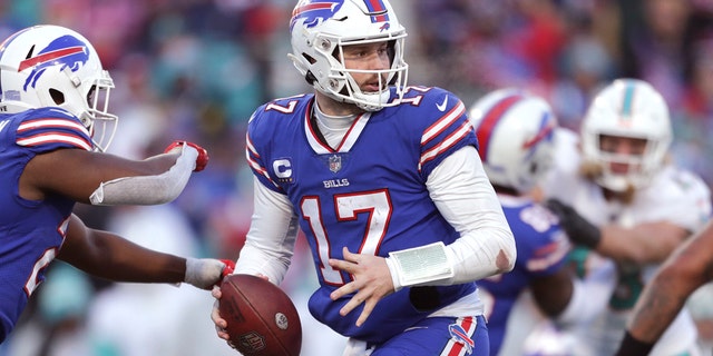 Josh Allen drops back to pass