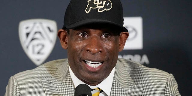 Deion Sanders at a press conference