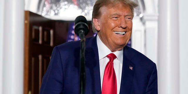 Former President Donald Trump smiling