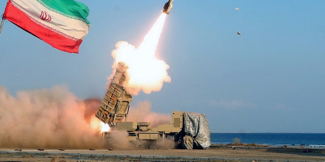 Iranian missle launch, Iran flag at left