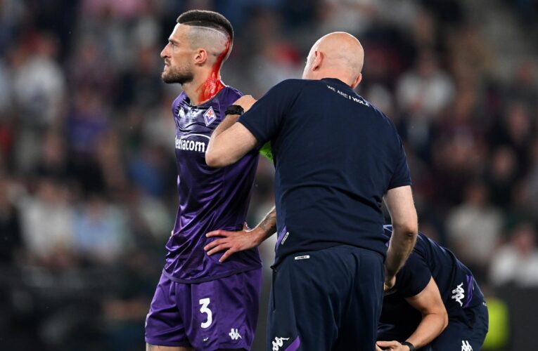 Play stopped in Europa Conference League final as Cristiano Biraghi struck by missile thrown from crowd