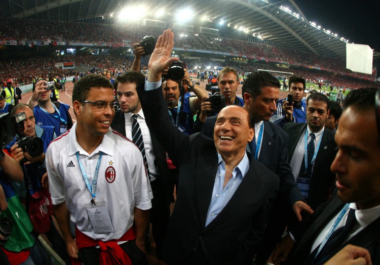 Silvio Berlusconi and Brazilian football star Ronaldo (left) arrive for the Champions League final football match against Liverpool at the Olympic Stadium, in Athens, on May 23, 2007. 