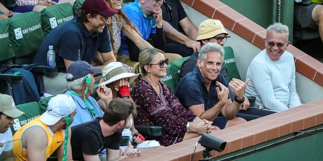 Actor Ben Stiller interacts with Ben Stiller at a Tennis match