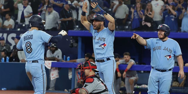 Cavan Biggio celebrates home run