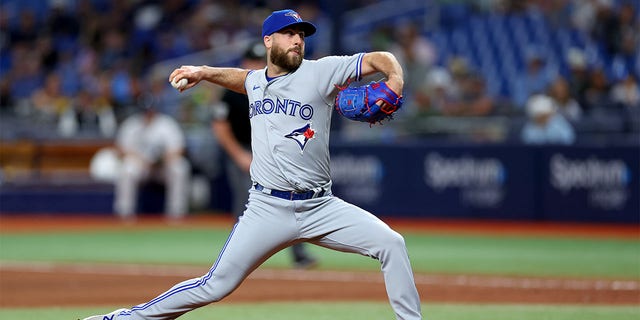 Anthony Bass throws a pitch