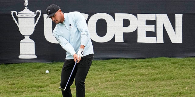 Bryson DeChambeau chips a shot