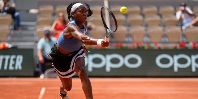 Coco Gauff plays a forehand shot