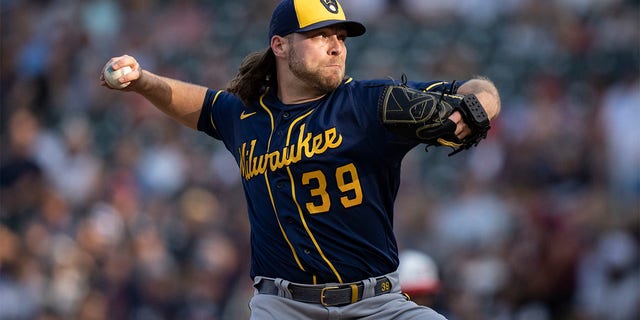 Corbin Burnes throws a pitch