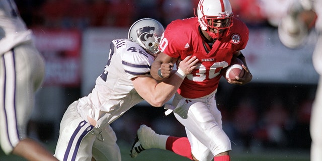 Dahrran Diedrick carries the ball during a football game