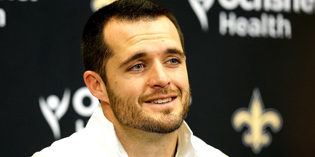 Derek Carr speaks to reporters