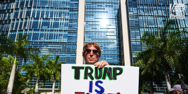 Demonstrators rally outside of a Miami Federal Courthouse ahead of Donald Trumps arraignment