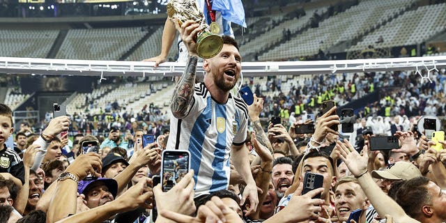 Lionel Messi celebrates winning the World Cup