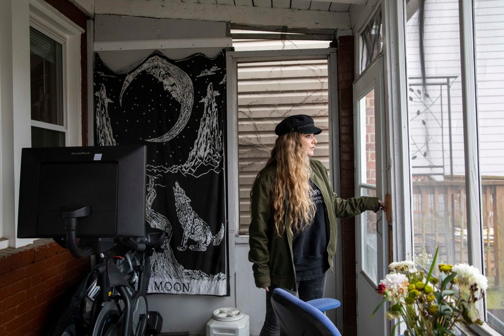 Amber Escudero-Kontostathis looks over her backyard at her home in Washington, D.C., on March 10, 2023.