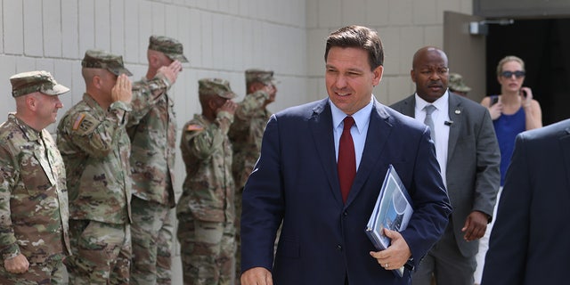 DeSantis walks by troops