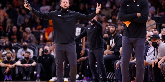 Kevin Young coaches against the Magic