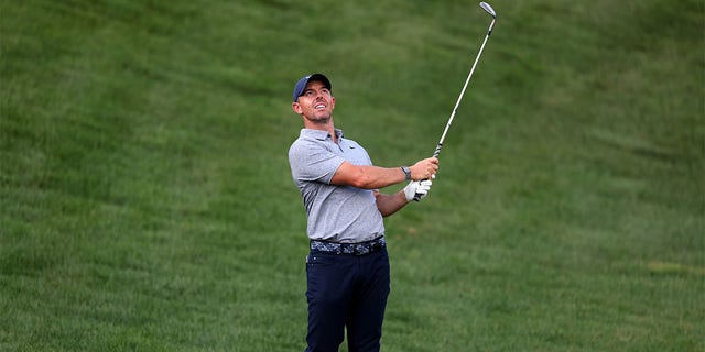 Rory McIlroy plays a shot during a practice round