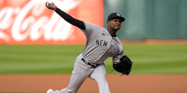 Domingo German pitches against the Oakland A's