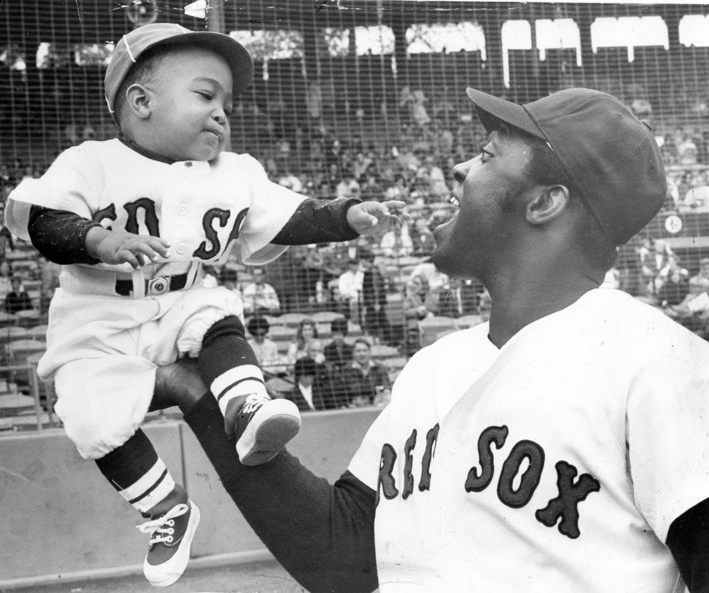 Boston Red Sox first Baseman George Scott and one-year-old son George Scott, Jr.