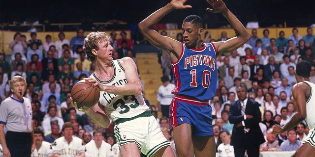 Dennis Rodman guards Larry Bird