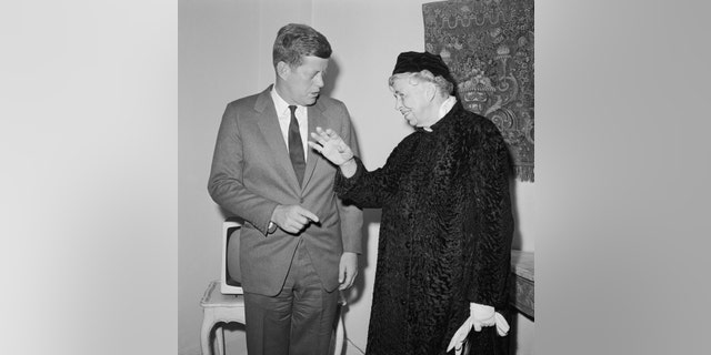 John F. Kennedy talks with Eleanor Roosevelt