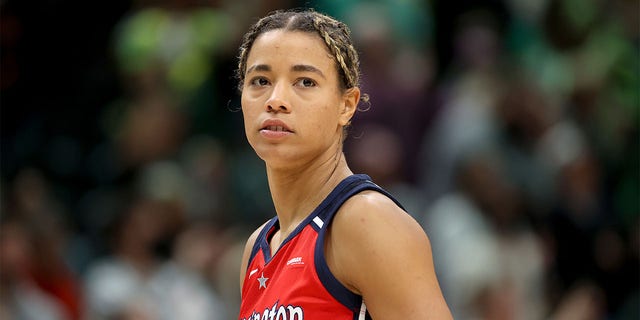 Natasha Cloud reacts during a game against the storm