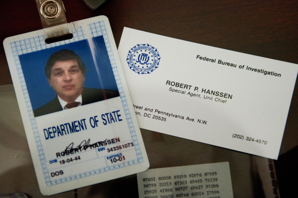 The identification and business card of former FBI agent Robert Hanssen are seen inside a display case at the FBI Academy in Quantico, Virginia, May 12, 2009. 