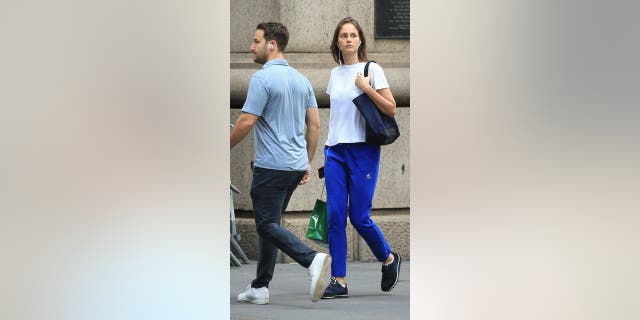 Jeffrey Epstein's last girlfriend Karyna Shuliak walks with shopping bags