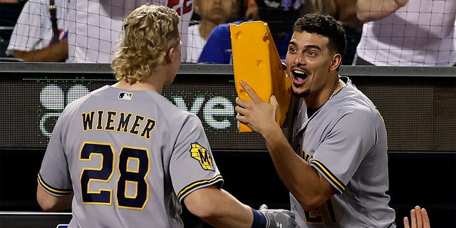 Joey Wiemer is congratulated by Willy Adames