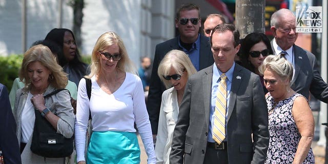 Holloway family and friends walk to the U.S. Attorney's Office